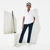 Slim fit-pikétröja med UV-skydd och stretch för damer Slim fit-pikétröja med UV-skydd och stretch för damer
