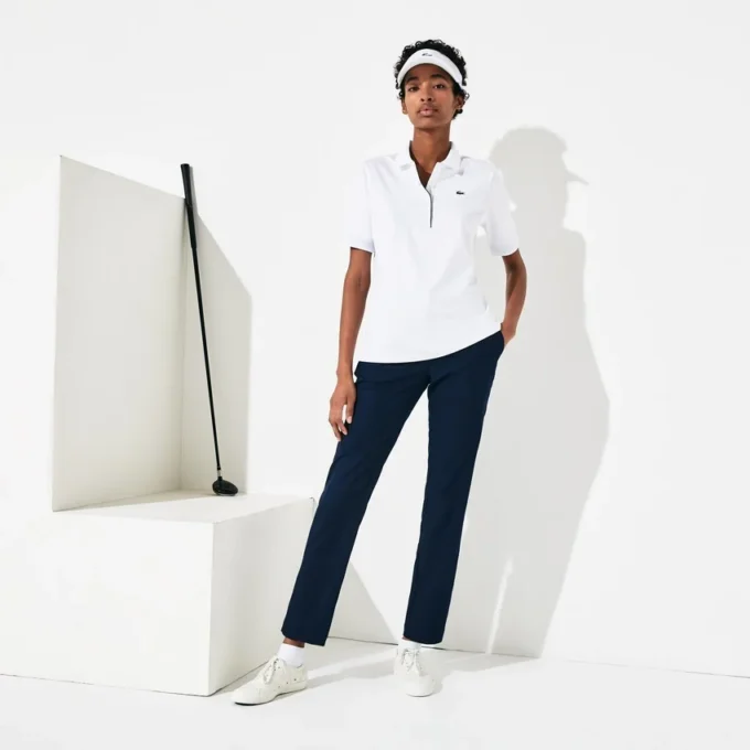 Slim fit-pikétröja med UV-skydd och stretch för damer Slim fit-pikétröja med UV-skydd och stretch för damer