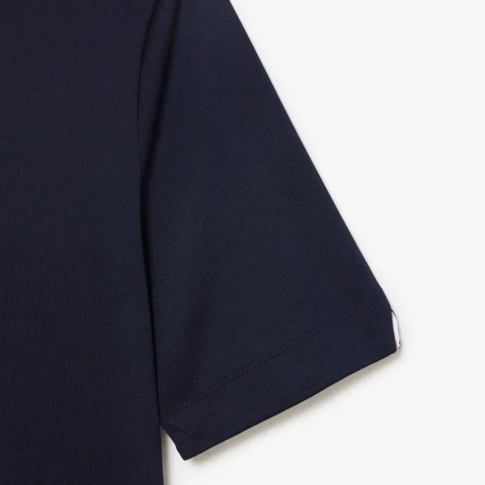 Slim fit-pikétröja med UV-skydd och stretch för damer Slim fit-pikétröja med UV-skydd och stretch för damer