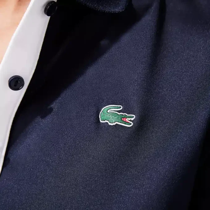 Slim fit-pikétröja med UV-skydd och stretch för damer Slim fit-pikétröja med UV-skydd och stretch för damer
