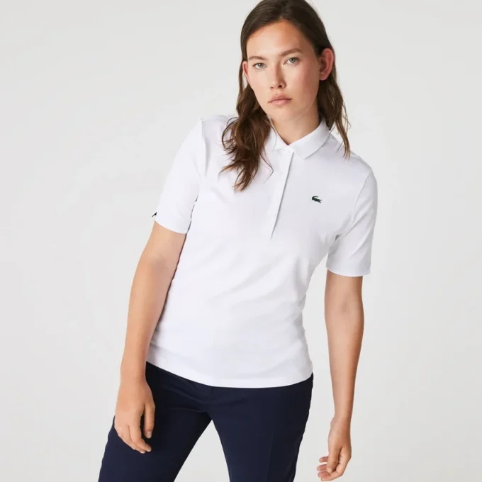 Slim fit-pikétröja med UV-skydd och stretch för damer Slim fit-pikétröja med UV-skydd och stretch för damer