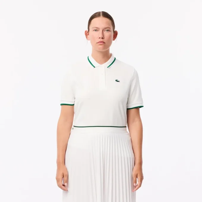 Tennispikétröja med UV-skydd och randig krage för damer Tennispikétröja med UV-skydd och randig krage för damer