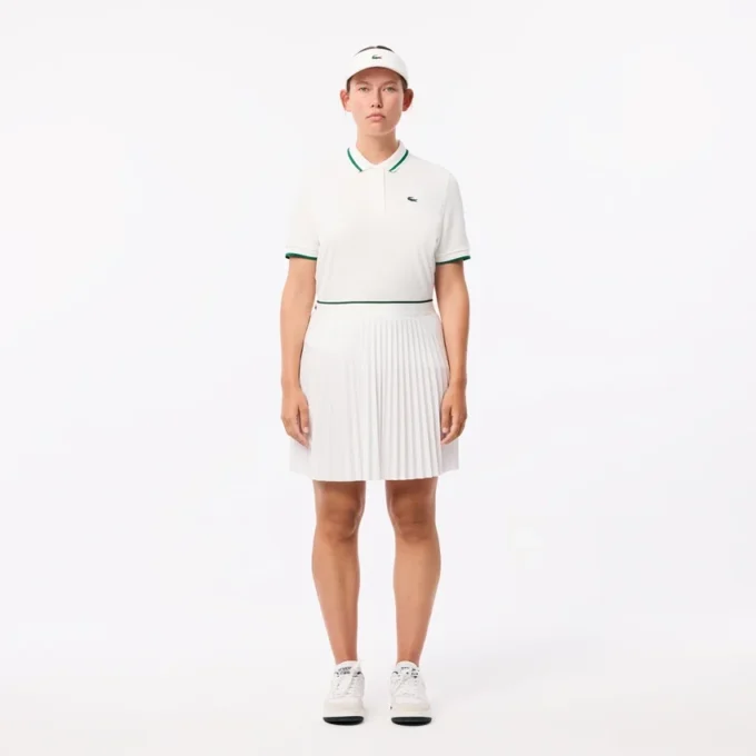 Tennispikétröja med UV-skydd och randig krage för damer Tennispikétröja med UV-skydd och randig krage för damer
