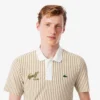 Termoreglerande randiga golfpikétröjor för herr Termoreglerande randiga golfpikétröjor för herr