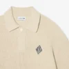 Tröja med polokrage i pärlribb och badge-detalj Tröja med polokrage i pärlribb och badge-detalj