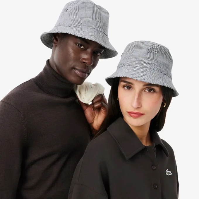 Unisex bucket hat i bomull med dubbelsidig rutmönster Unisex bucket hat i bomull med dubbelsidig rutmönster