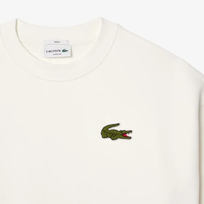 Unisex-fleecetröja med lös passform och emblem