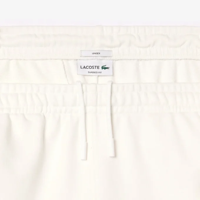 Unisex-joggingbyxor med avsmalnande ben Unisex-joggingbyxor med avsmalnande ben