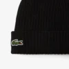 Unisex-mössa i ribbstickad borstad ull Unisex-mössa i ribbstickad borstad ull