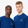 Unisex T-shirt i tjock bomull med lös passform och emblem Unisex T-shirt i tjock bomull med lös passform och emblem