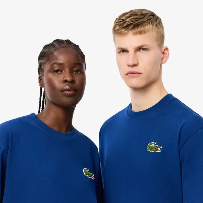 Unisex T-shirt i tjock bomull med lös passform och emblem Unisex T-shirt i tjock bomull med lös passform och emblem
