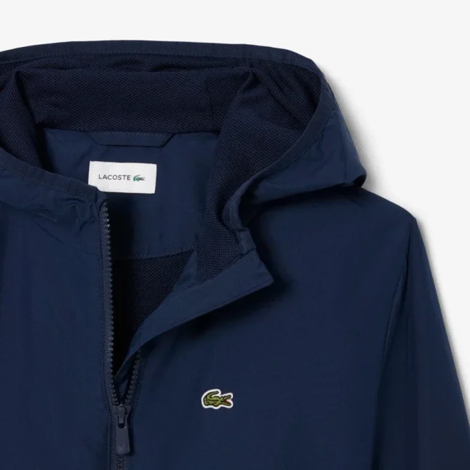 Unisex-vindjacka med huva Unisex-vindjacka med huva