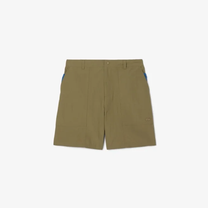 Vattenavvisande och vindbeständiga nylonshorts för herr Vattenavvisande och vindbeständiga nylonshorts för herr