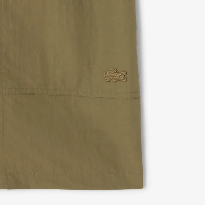 Vattenavvisande och vindbeständiga nylonshorts för herr Vattenavvisande och vindbeständiga nylonshorts för herr