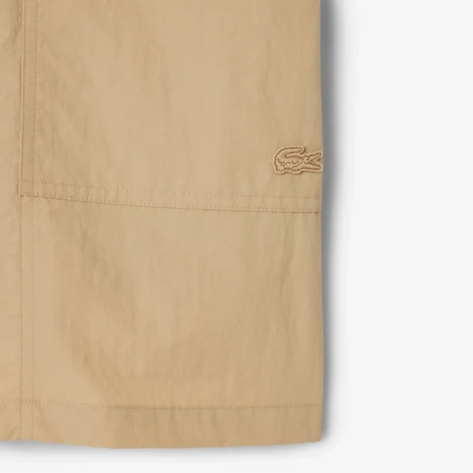 Vattenavvisande och vindbeständiga nylonshorts för herr Vattenavvisande och vindbeständiga nylonshorts för herr