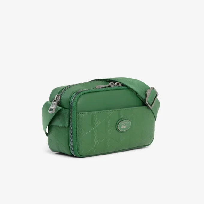 Vertikal läderväska med monogram Vertikal läderväska med monogram