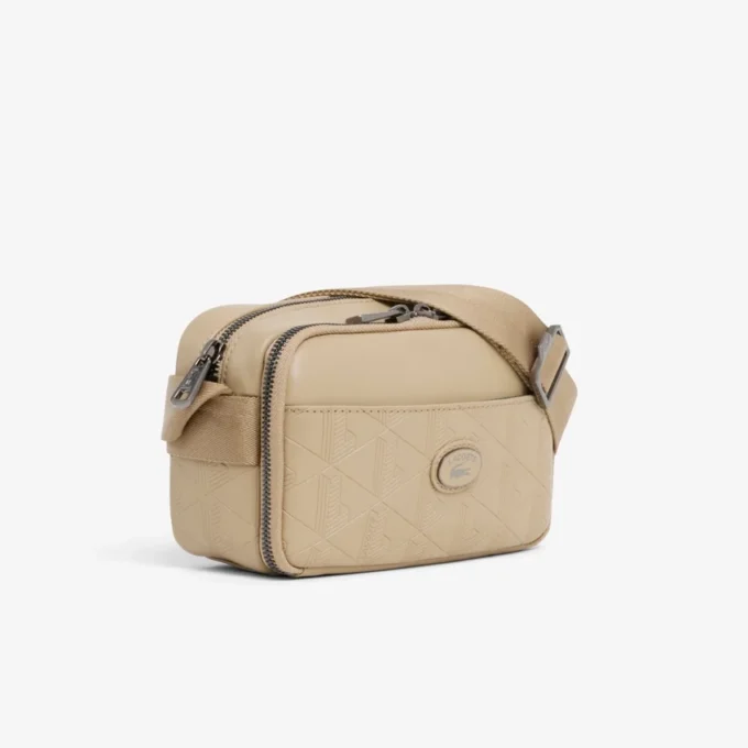 Vertikal läderväska med monogram Vertikal läderväska med monogram