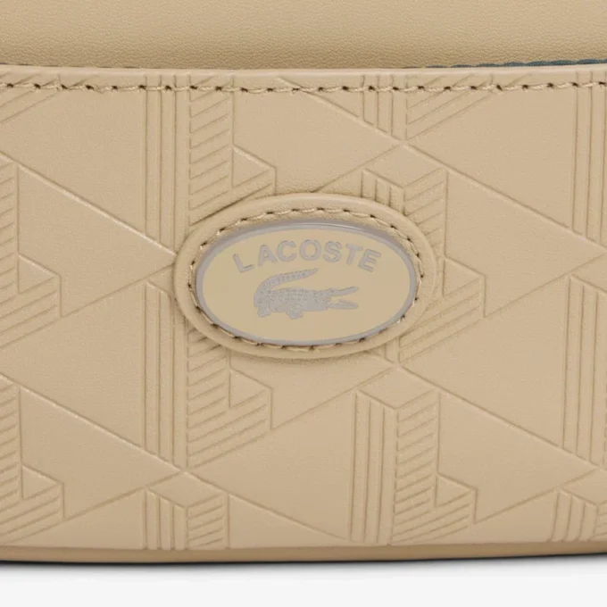 Vertikal läderväska med monogram Vertikal läderväska med monogram